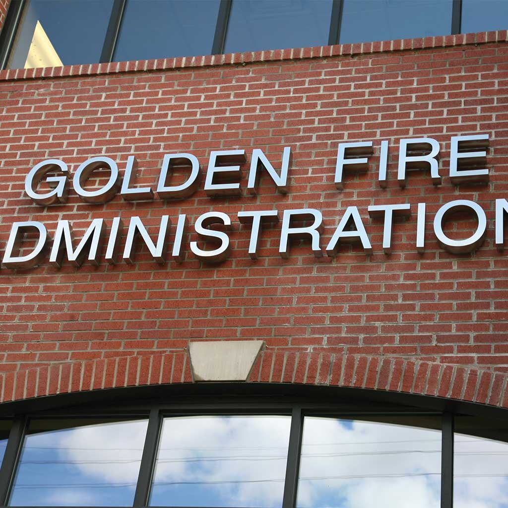 cast metal signage